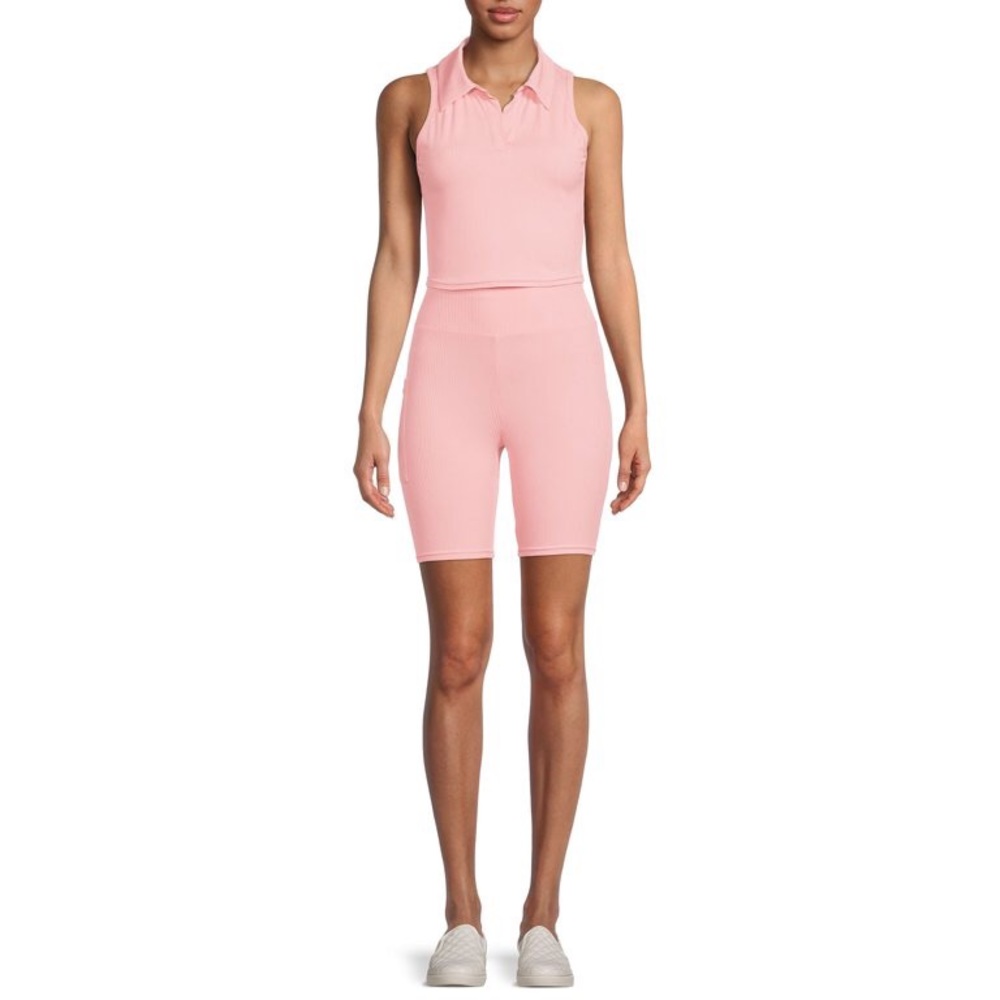 Pink tank top and bike shorts.
